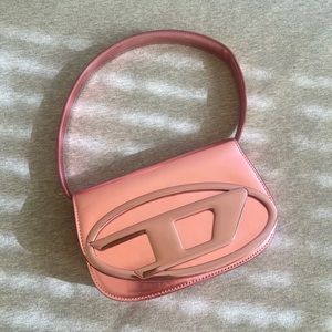 RARE diesel 1DR bag in pink. Comes with original tags, long strap + dustbag